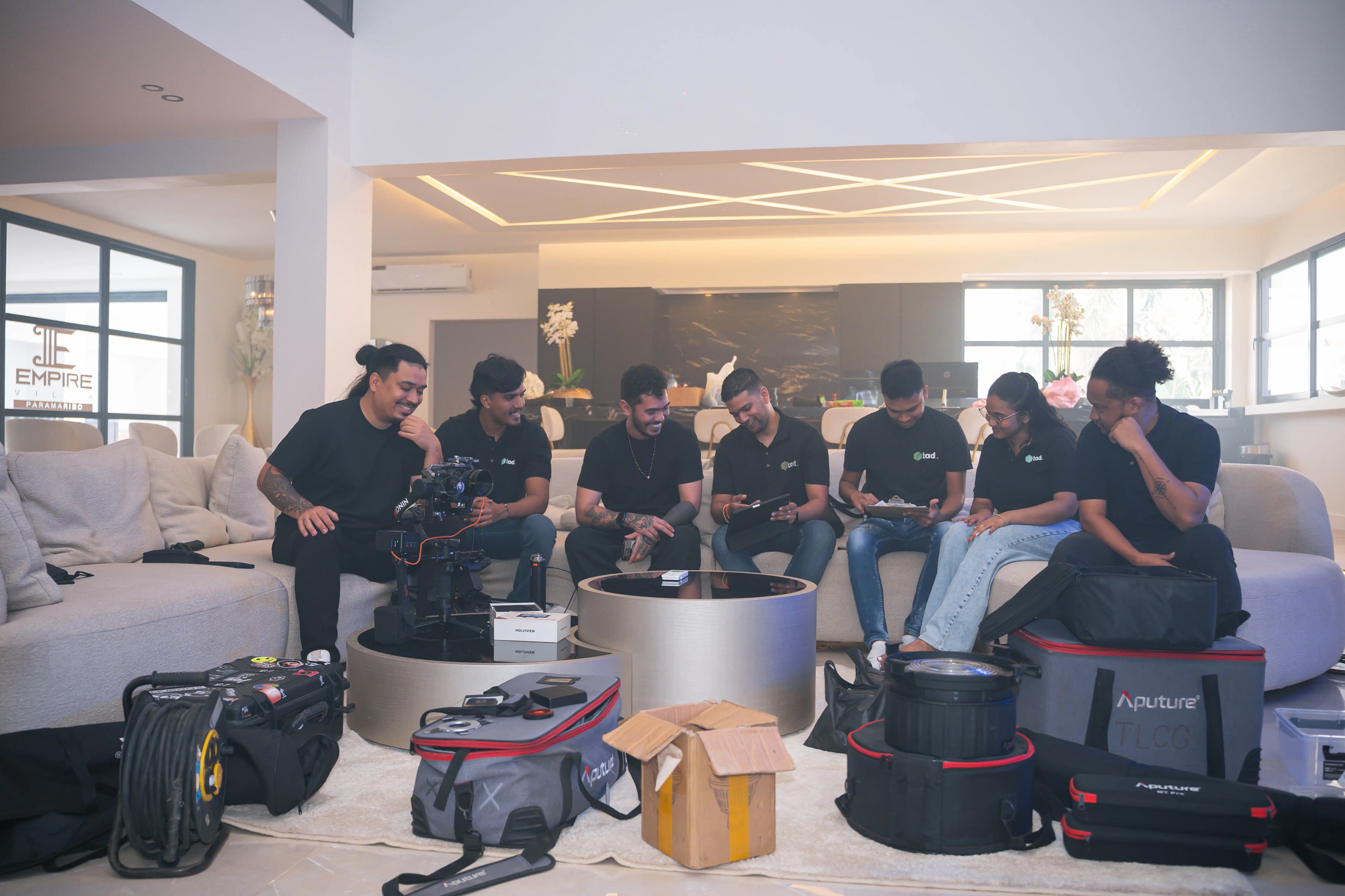 The TAD team with production gear in the studio
